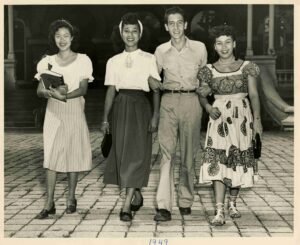 The picture from an article in the Tampa Tribune of foreign students who attended the University of Tampa. From left to right: Marguerite Lee, Eleanor Camacho (Guam), Athanassios George Anastassiades (Athens, Greece), Evelyn J. Perez (Guam).
